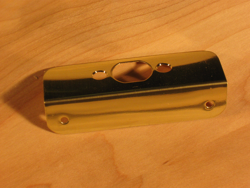 L- shaped Escutcheon plate Brass in color